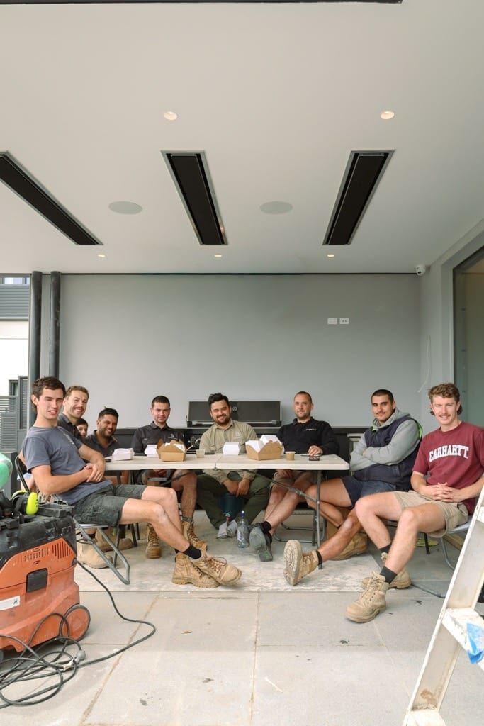 The Siji crew together at lunch on site